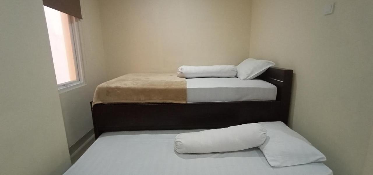 Giant Kost Hotel Tangerang Exterior photo